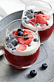 Strawberry dessert with chia, cream and fruits