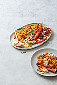 Baked rice with grilled peppers and feta