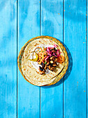 Chicken tortillas with red onion and pickles