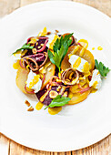 Salt baked beetroot salad, with goats curd, smoked anchovy, pickled shallots, hazelnuts and a mustard vinaigrette