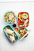 4x healthy lunch 'To Go' - pasta salad, shrimp salad, crudites with dip, wraps.