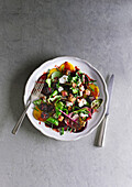 Beet salad with goat's cheese, blackberries, and poppy seed croutons