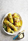 Corn on the cob with bacon and jerk butter