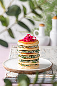 Spicy pancakes with spinach, stacked