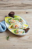 Chicory boats with salmon cream cheese