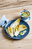 Fried chicory with basil dip