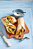 Tex-Mex wraps with chicken and yogurt dip
