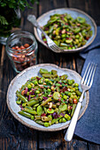 Broad bean, green bean and shallot salad with raisins