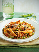 Penne with anchovies and peas