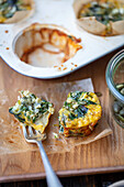 Mini frittatas with grainy cream cheese and spinach