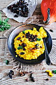 Vegan pumpkin risotto with crunchy roasted seeds and nuts