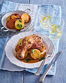 Beer braised chicken thighs with baked potatoes