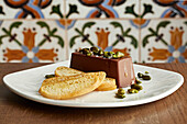 A chocolate and pistachio dessert