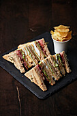 Club sandwiches served with fries