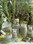 Still life with herb salt and herbs being hung to dry