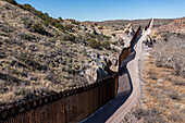 US-Mexico border fence in Guadalupe Canyon