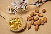 Almond oil, capsules and flowers