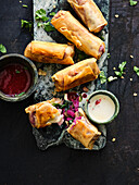 Cabbage spring rolls with sweet plum and garlic dip