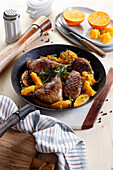 Pan roasted duck with oranges and rosemary