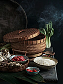 Ingredients for Asian cuisine in a bamboo steamer