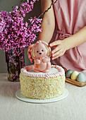 Easter cake with pink chocolate bunnies