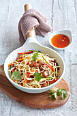 Egg noodles with vegetables and crispy chicken