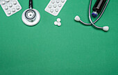 Stethoscope and pill tablets