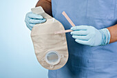 Ostomy bag and clip