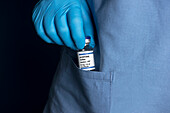 Medication theft by healthcare professional, conceptual image
