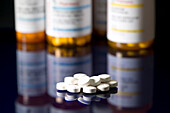 Tablets with prescription bottles