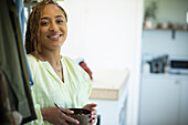 Smiling woman with a bowl of food