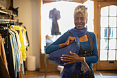 Female shopper with blue handbag in shop