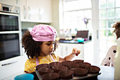 Girl baking in kitchen
