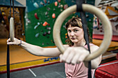 Determined young woman exercising