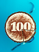 Festive cake with Gran Marnier and the number 100