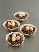 Sweet Easter nests of shredded wheat (cereals) and chocolate cadbury mini eggs