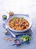 Spicy seafood stew with tomato and lime