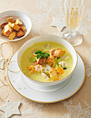 Creamy fish soup with saffron for Christmas