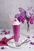 Blueberry smoothie with whipped cream