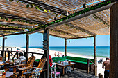 Beach bar on Praia da Ilha da Farol beach, near Olhao, Faro, Portugal