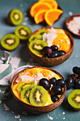 Mango smoothie bowl kiwi oranges grapes coconut