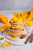 Pancakes mango oranges