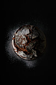 Rye bread on a black background