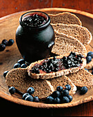 Blueberry jam and slices of bread