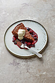 French chocolate tart with berry compote