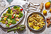 Niscoise salad, artichoke dish (Italy)