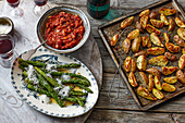 Rosemary potatoes, asparagus with parmesan, tomato and onion ragout