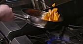 Frying the carrots in the pan