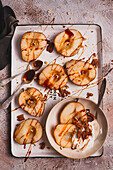 Baked pears with yoghurt and pecans