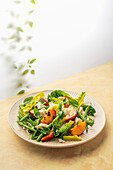 Summer salad with grilled nectarines, green beans, mozzarella and basil